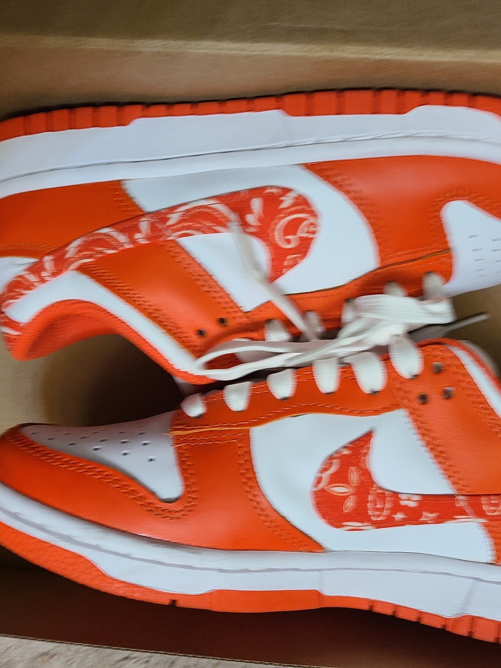 Nike Women's Orange & White Low-Top Sneakers with Paisley Swoosh